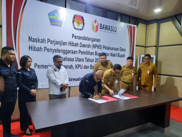 Capaian Progresif, Pemkab Minut Tandatangani NPHD Pilkada 2024 Rp59 Miliar Bersama KPU Minut